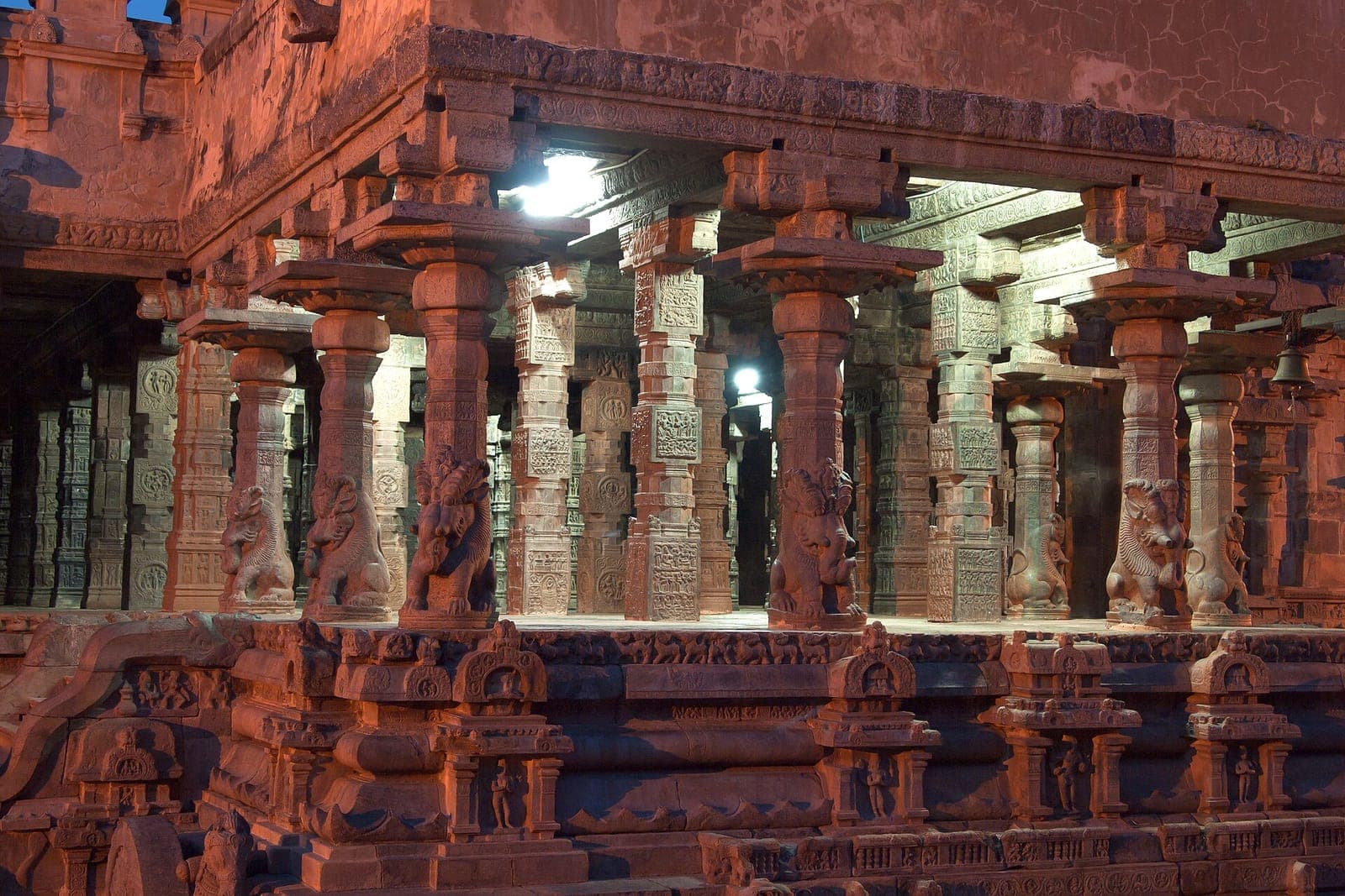 Carved stone pillars of the Airavatesvara Temple, Darasuram, lit at night