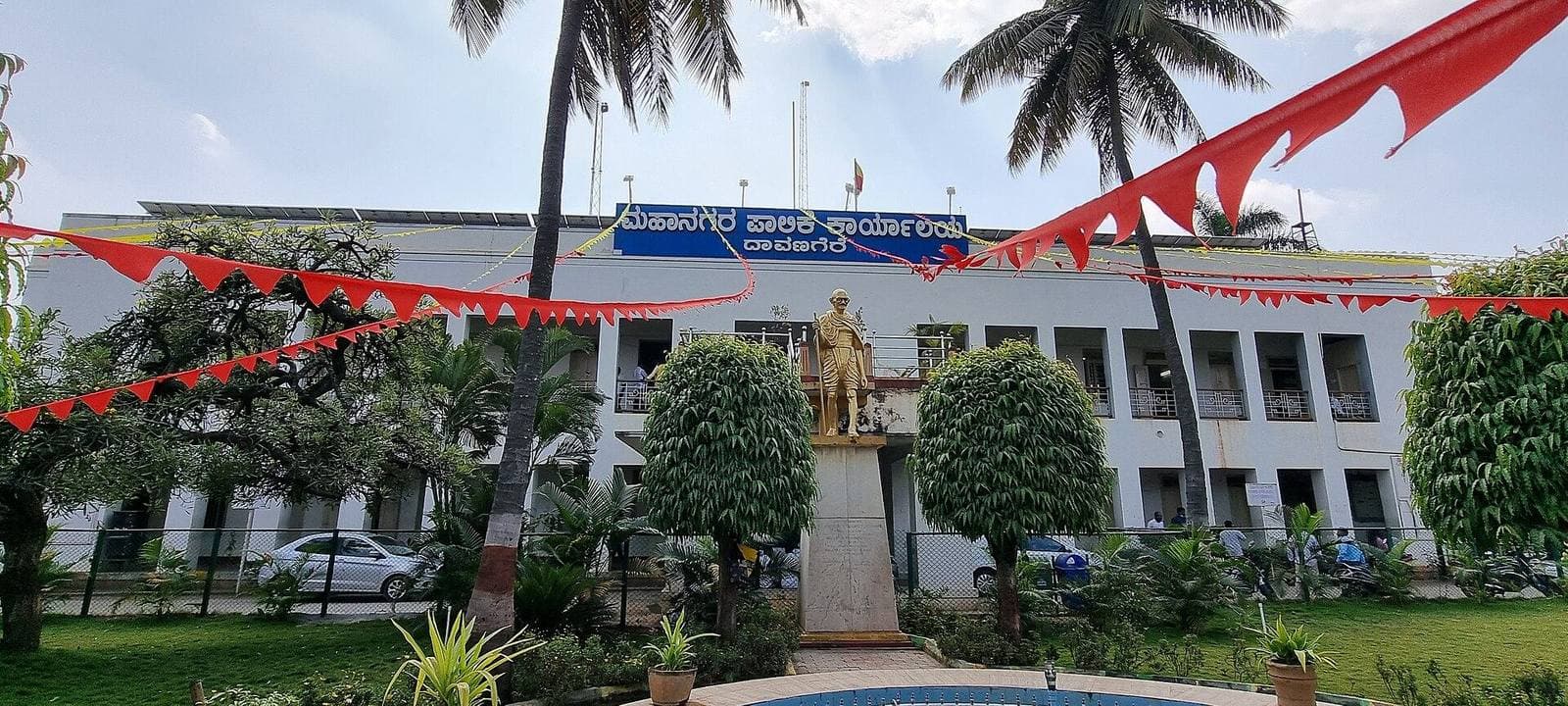 A government building and statue in Davanagere