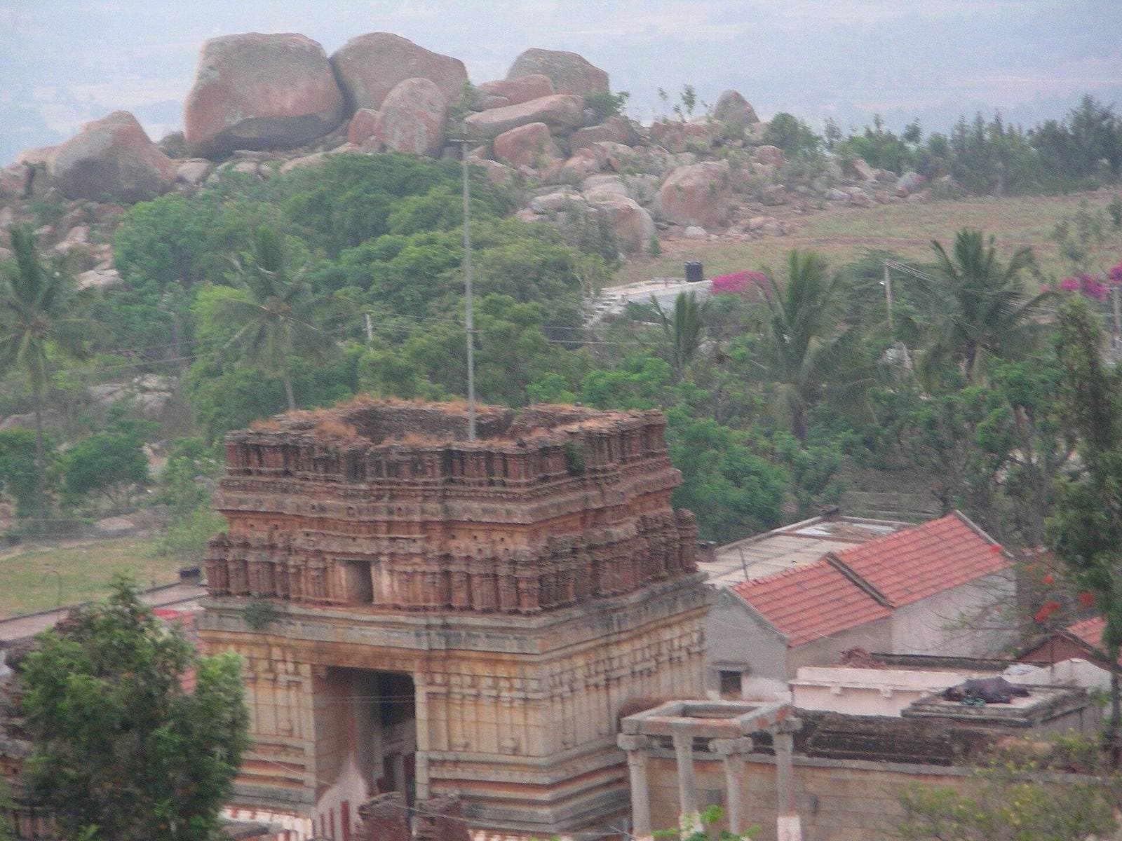 A stone temple below boulder hills near Kolar