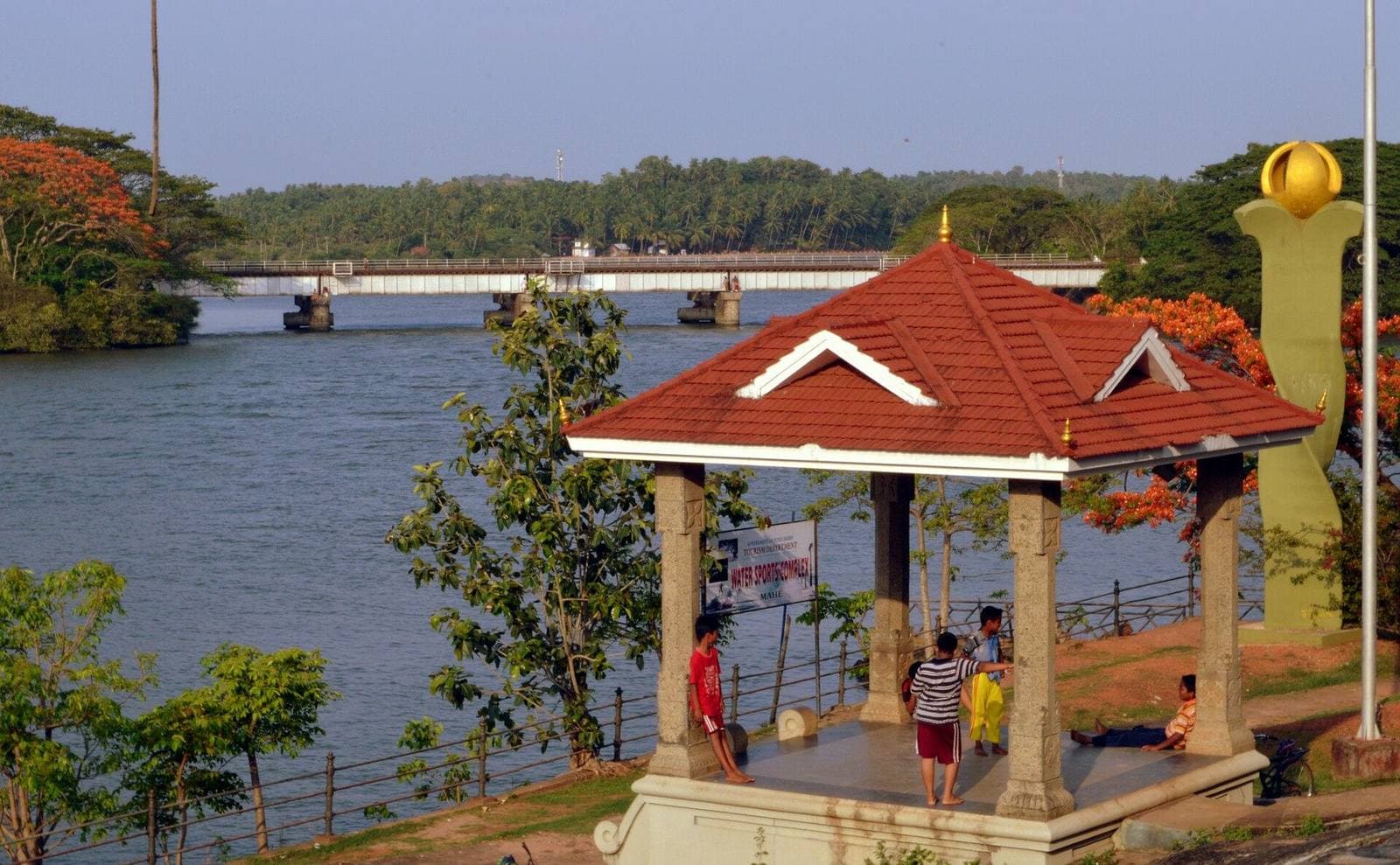 A pavilion overlooking the Mahe river and bridge