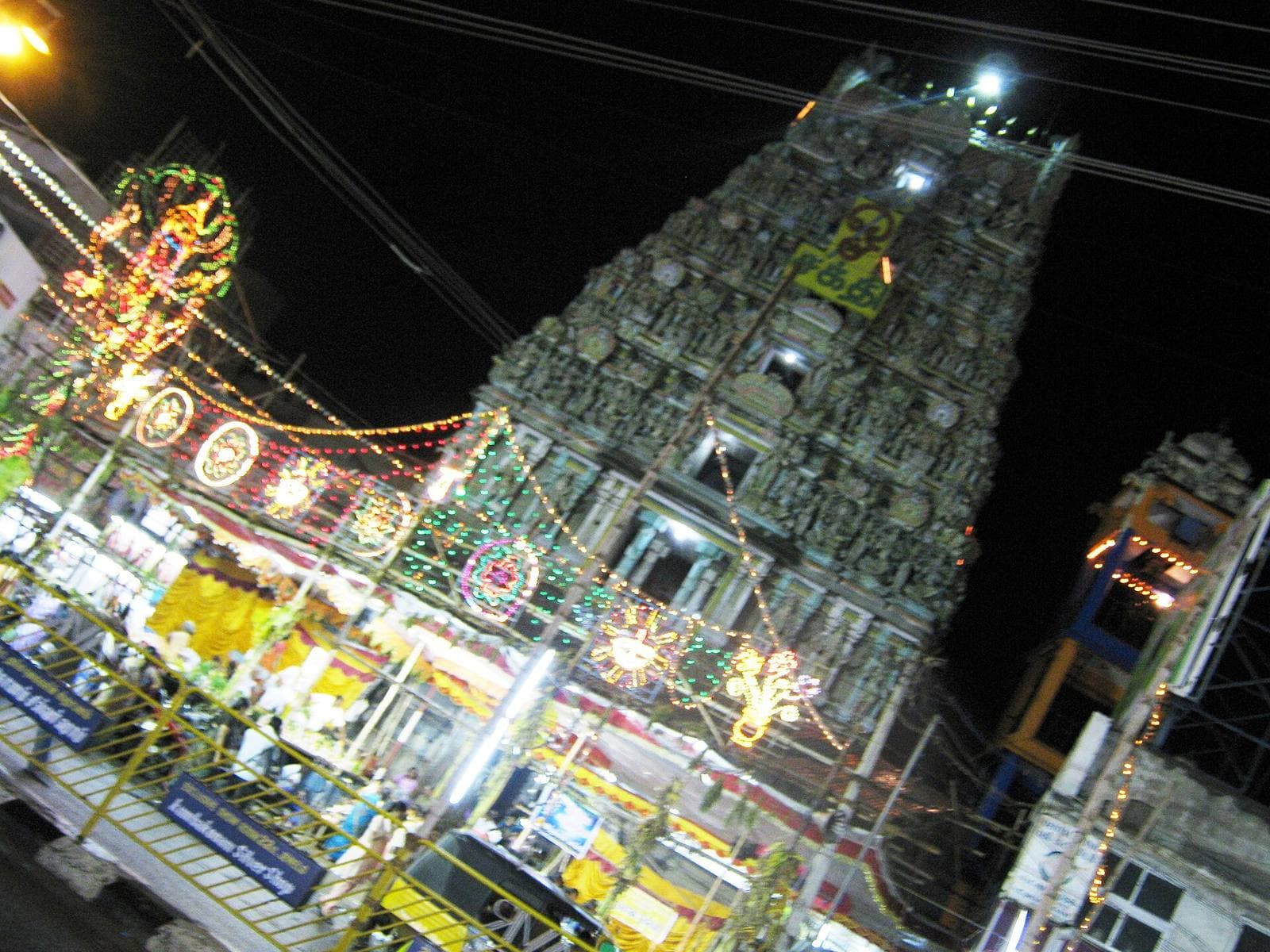 The Kottai Mariamman Temple tower in Salem, lit for a festival