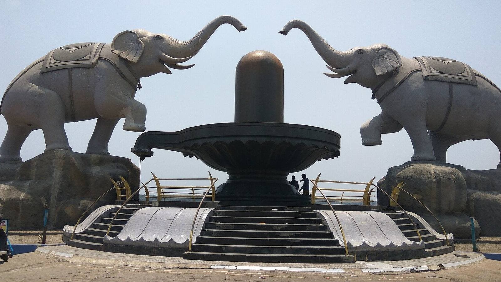 A Shiva linga monument flanked by elephant statues, Yanam