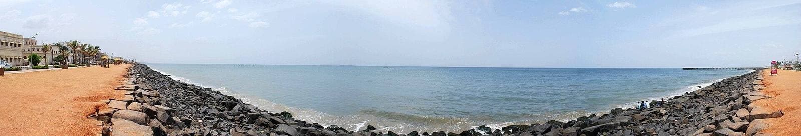 A wide view of the rocky seafront at Puducherry